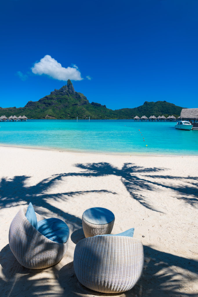 Bora Bora, French Polynesia
Crystal-clear turquoise waters, luxurious overwater bungalows, and powdery white sand beaches with lush green mountains in the background.