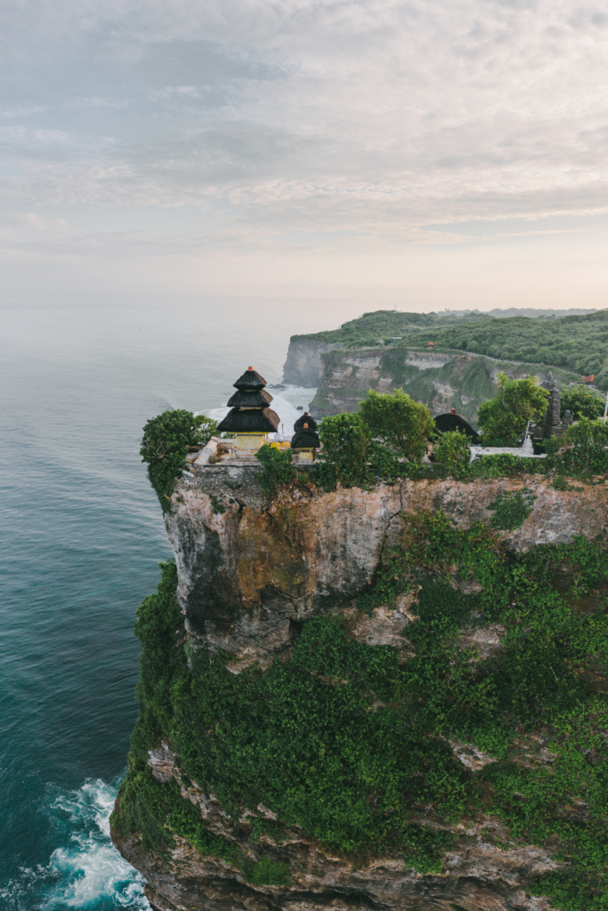 stunning Uluwatu Temple with beautiful cliff views of the ocean.