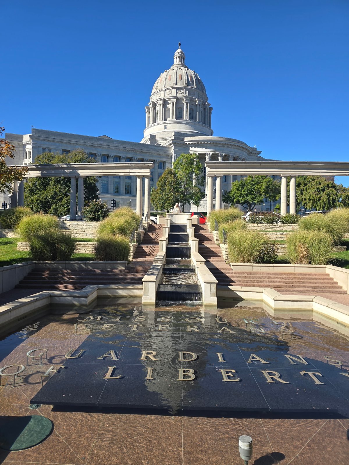 Guardians of Liberty fountain with the Missouri Capitol dome behind it
