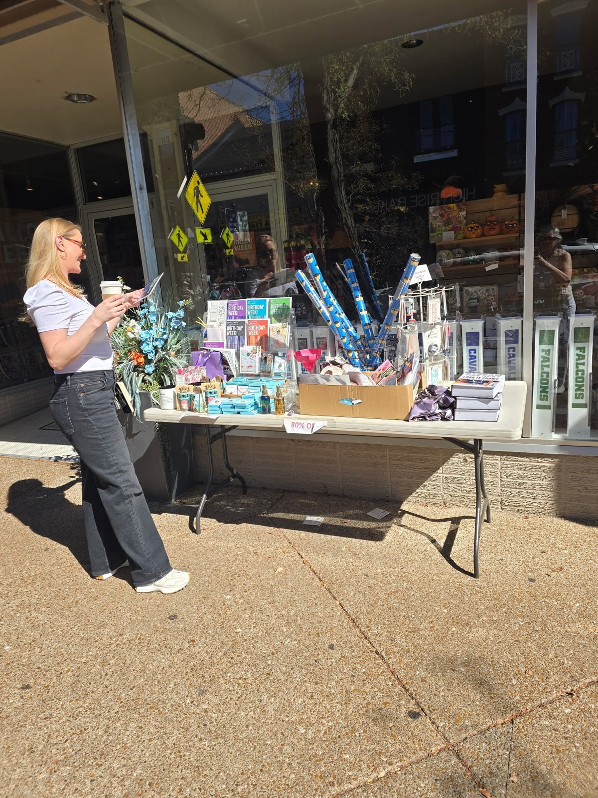 Window shopping outside a shop on High Street